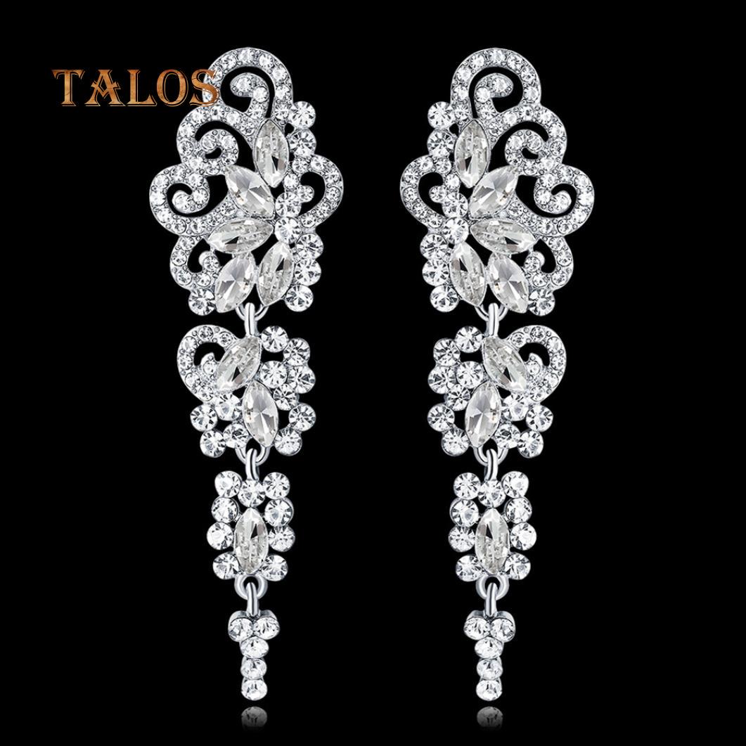 

Женские серьги оригинального дизайна из ювелирного сплава с горным хрусталем