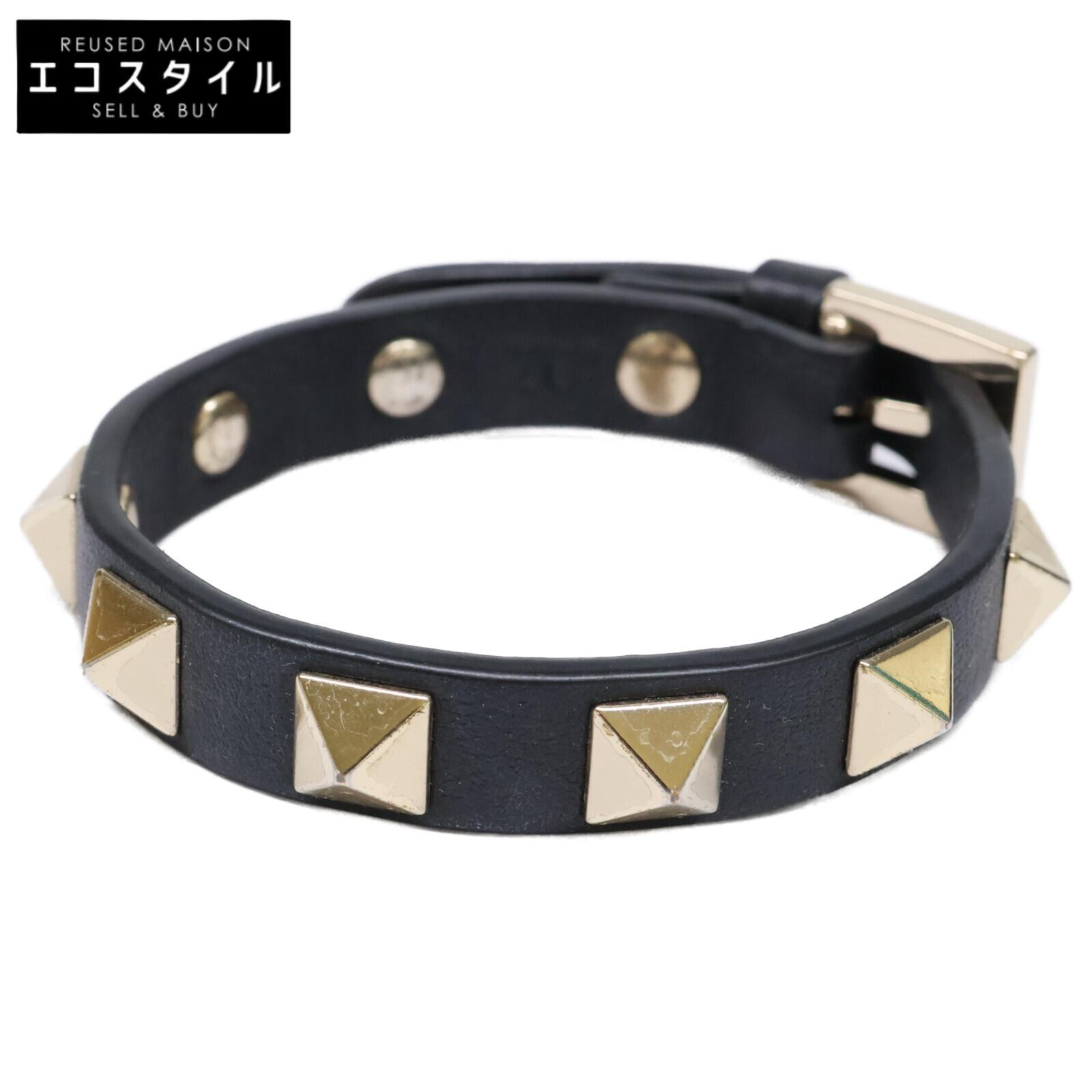 

Valentino Garavani Rock Studs Leather Bracelet Black / goldUsed