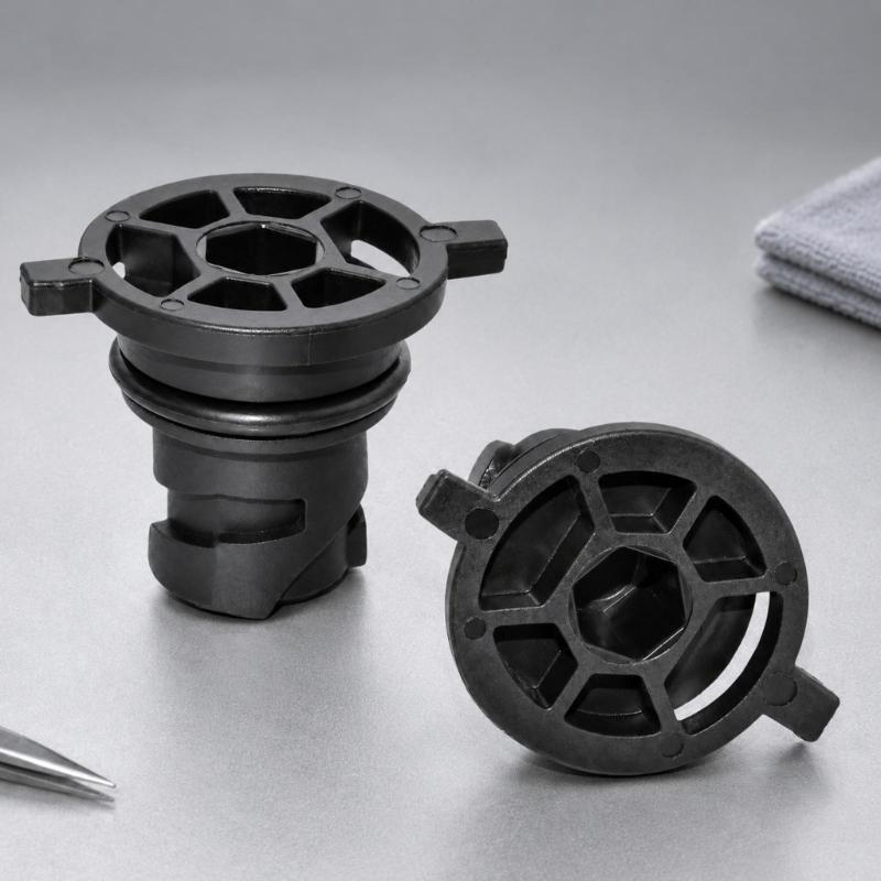 111116RC2B Black Automotive Oil Drain Closure with Two Opposing Grips, Recessed Center Drive, and Round Engineering Plastic Body