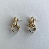 Used PHILIPPE AUDIBERT/gold twist loop earrings