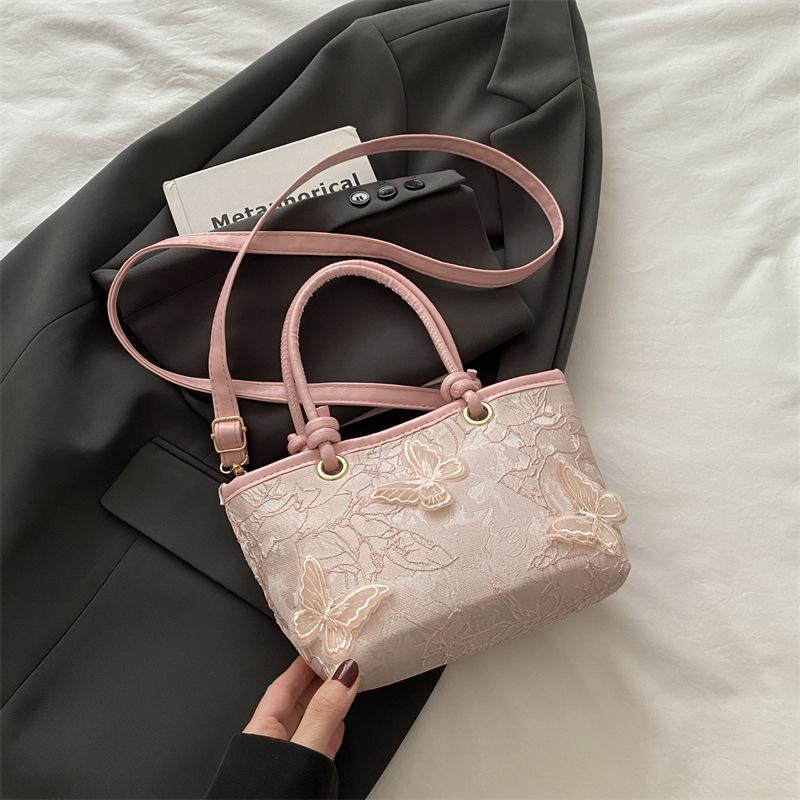 Super fire niche embroidered bag women's 2025 new summer versatile messenger bag fashionable portable bucket bag