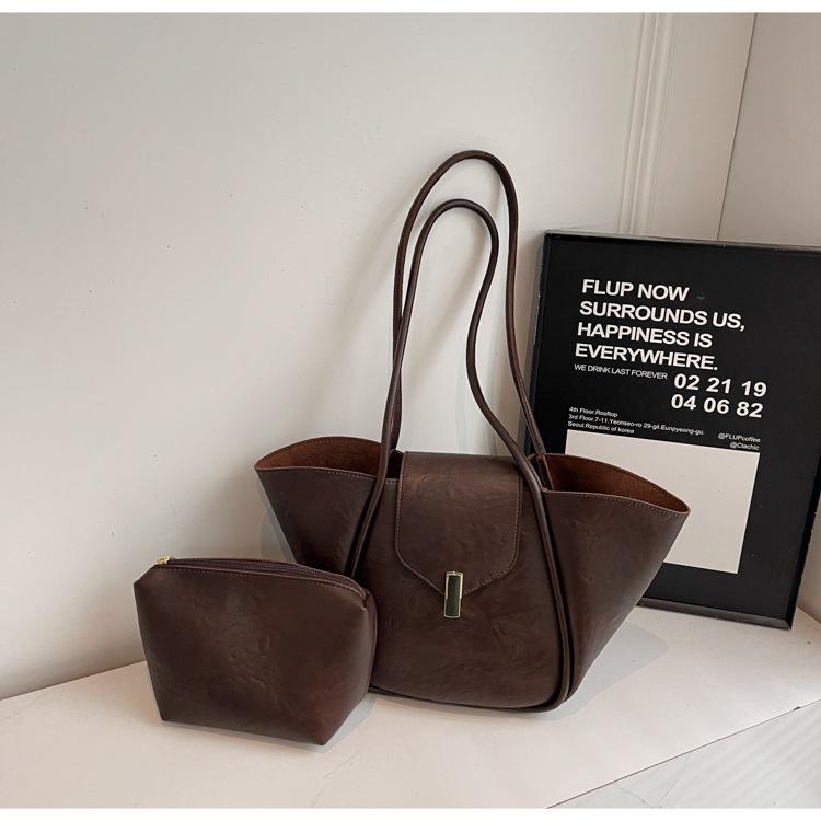 

Нишевая дизайнерская сумка-тоут для мамы женская 2025 новая большая вместимость ретро мода сумка-крыло сумка-мессенджер для通勤