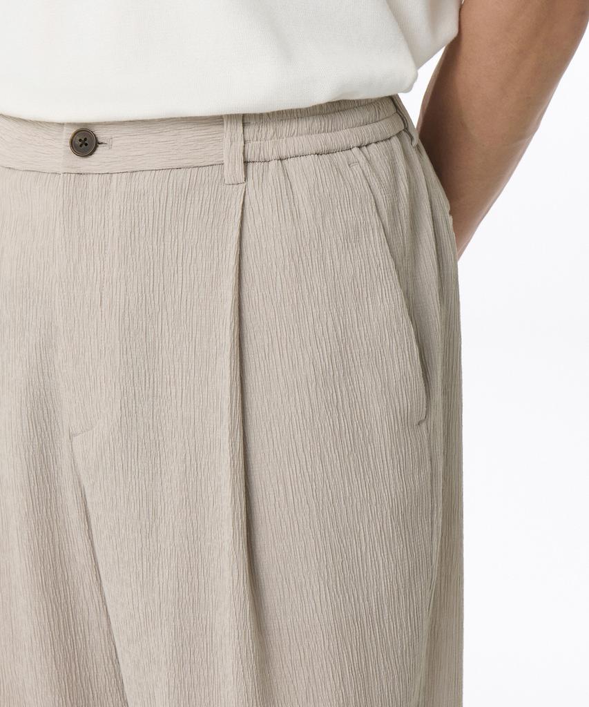 Musinsa Standard Crinkle Loose Tapered Elastic Waist Pants [Light Beige]