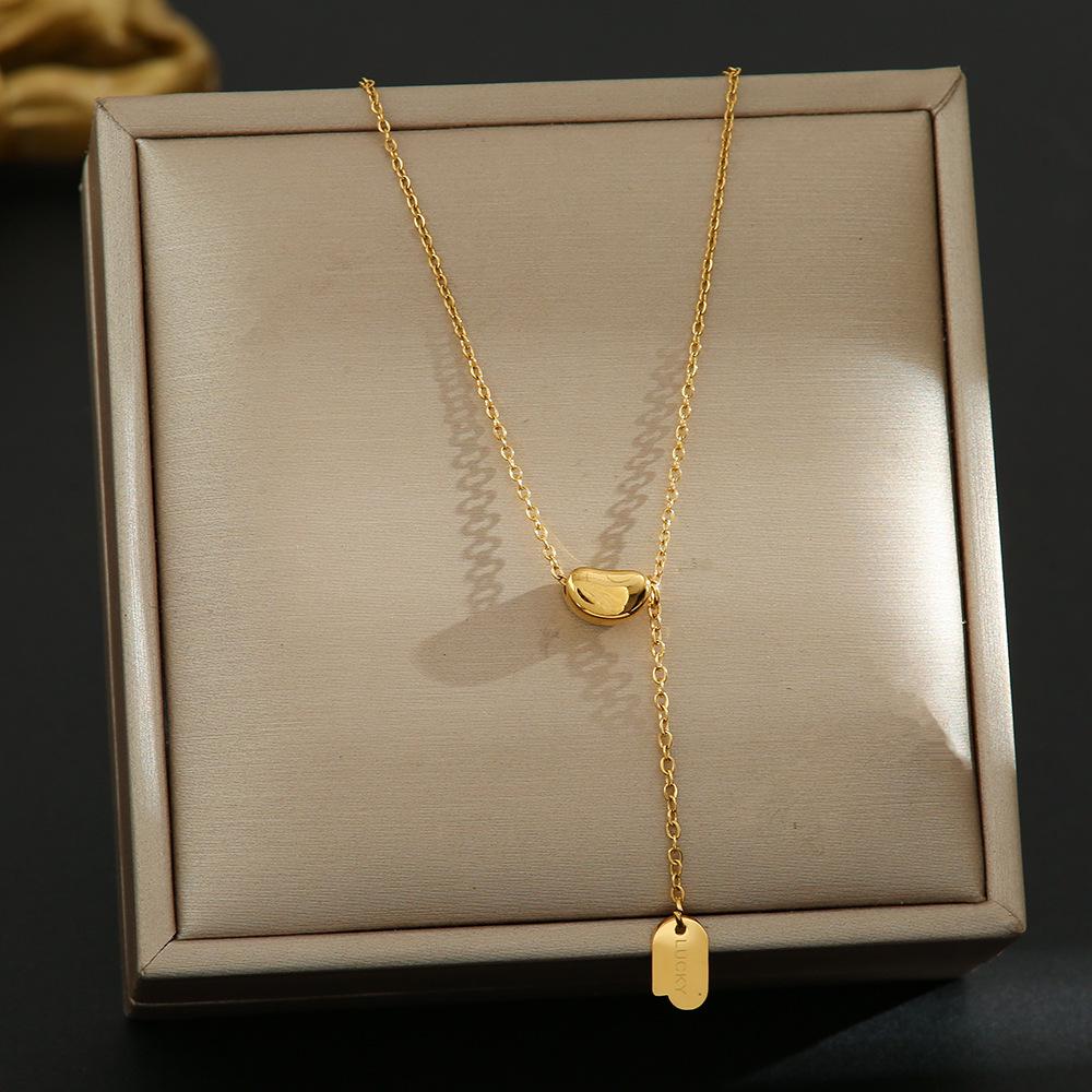 Elegant 18K Plated Titanium Steel Cross Necklace for Women - Light Luxury Clavicle Chain That Resists Fading
