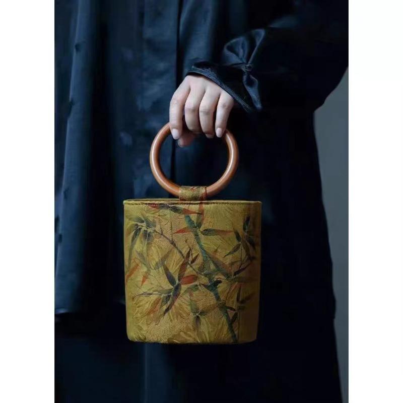 

Ethnic style round ring wooden handle Song Jin Tang Matu retro fortune bucket bag cylinder bag autumn and winter Chinese style