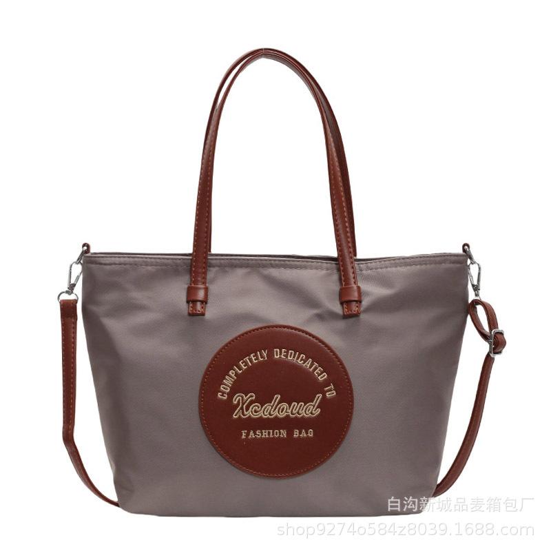 Stylish large-capacity messenger bag ins wind lightweight Oxford Buttot bag 2025 new casual commuter shoulder bag