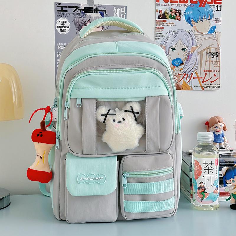 Campus schoolbag female junior high school student cute Japanese transparent pain bag backpack large capacity high school student backpack