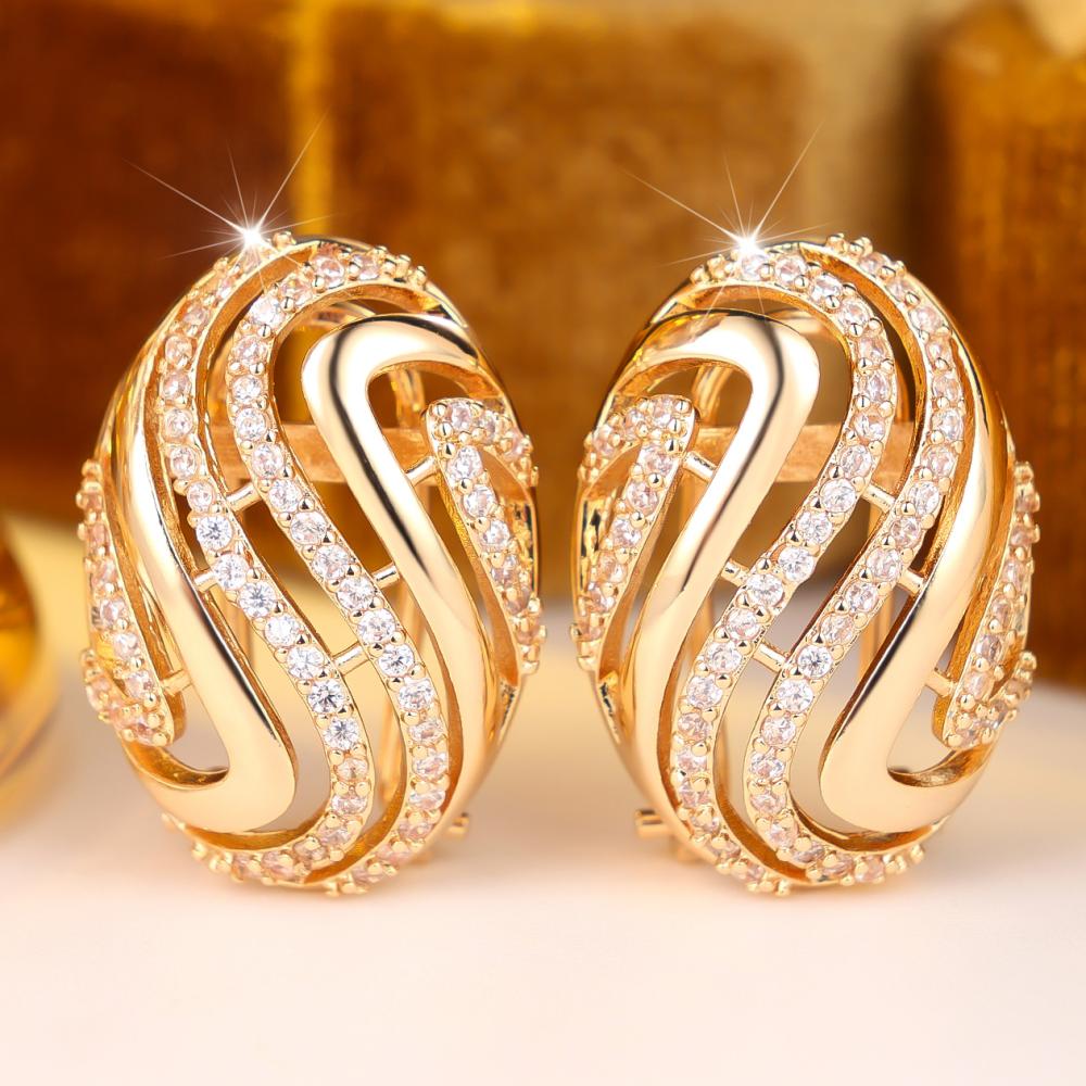 Luxury Gold Color Twisted Wave Shape White Zircon Paved Hollow Huggie Hoop Earrings for Women Gift