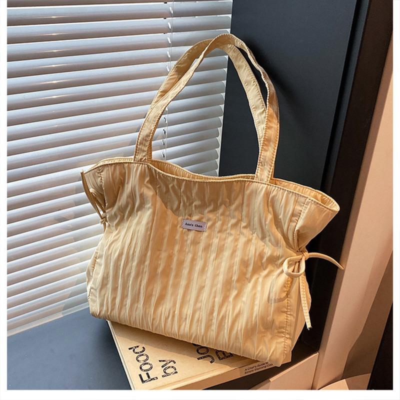 Large Capacity Tote Bag for Casual Commuting, Stylish and Elegant, with Pleated Drawstring Shoulder Strap.