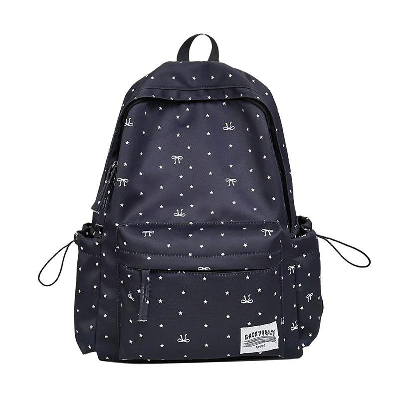 Schoolbag new ins style simple large capacity backpack polka dot bow design sense backpack versatile niche schoolbag women