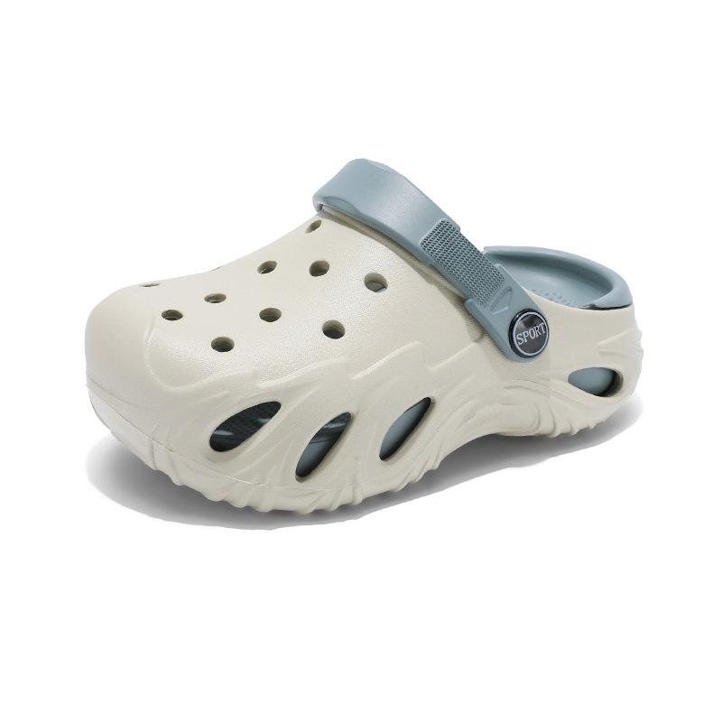 Children s hole shoes soft sole stepping on shit feeling outdoor wear sandals summer non-slip lightweight children s bag head slippers wholesale 28