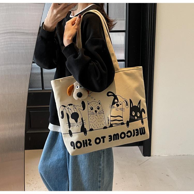 Casual large-capacity canvas bag women's new lightweight and versatile commuter shoulder bag portable tote bag