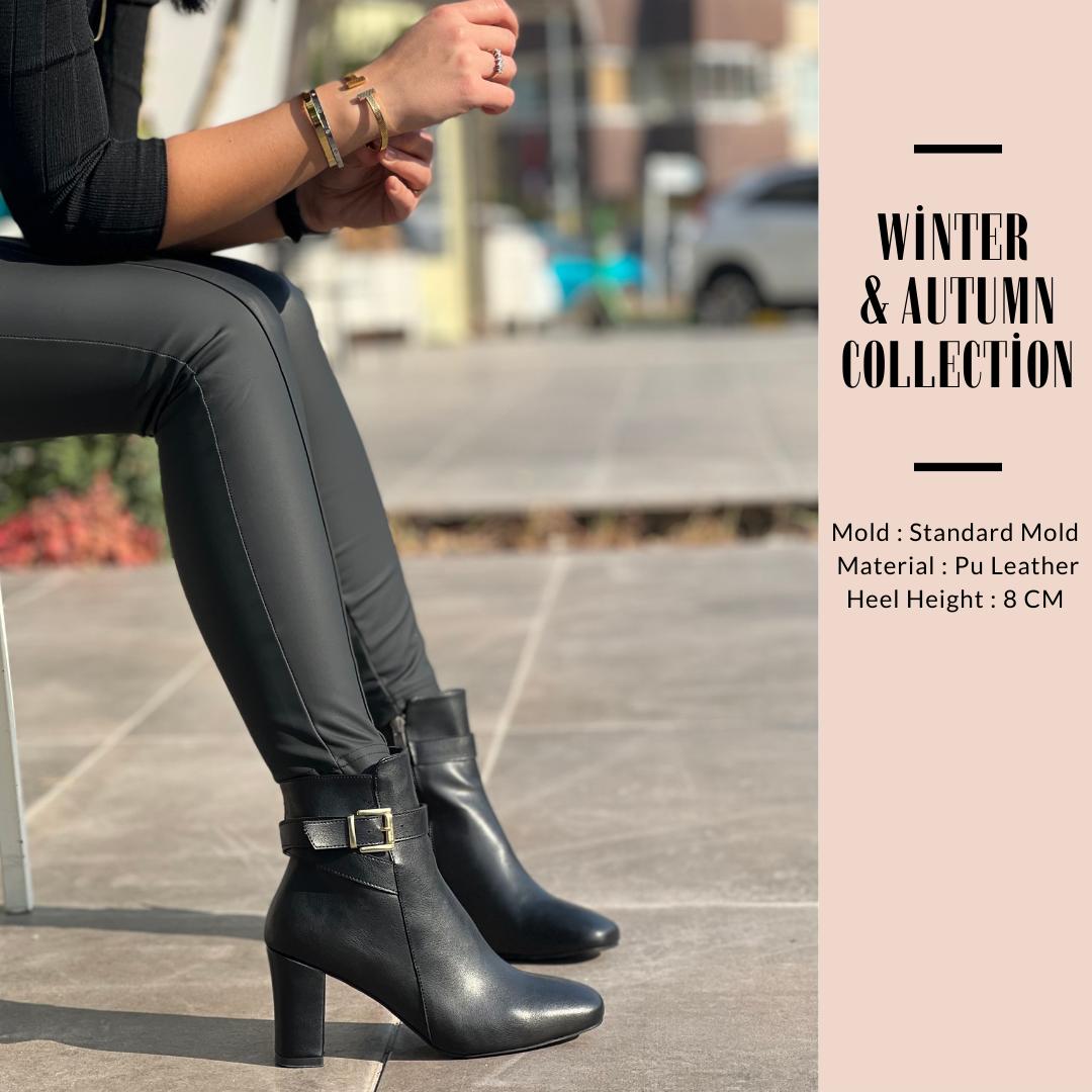 

Женские сапоги на массивном каблуке с пряжками на молнии Fergie