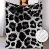 A Reversible Leopard Print Polyester Plush Blanket with a Black and White Animal Pattern, Modern Style, Suitable for All Seasons