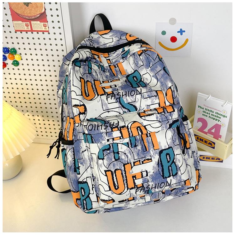 

College style personality large capacity graffiti new fashion personality trend lightweight shoulder book backpack фіолетовий