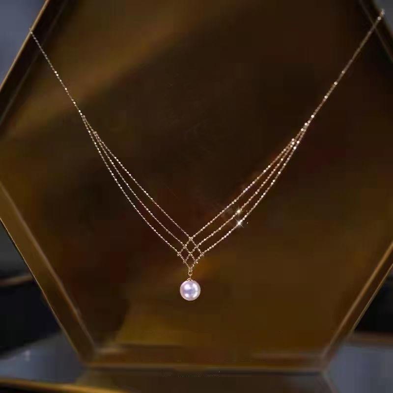 Elegancki Francuski Srebrny Naszyjnik z Perłą w Kształcie Serca - Luksusowy Łańcuszek na Kluczową Kostkę dla Kobiet