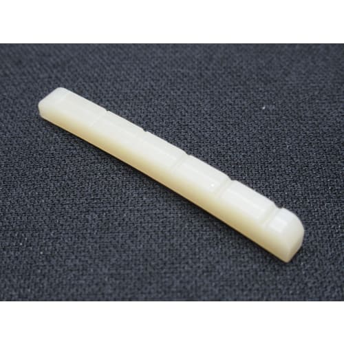 Unbleached, general-purpose grooved shaped bone nut (43mm wide) with a curved bottom for Fender guitars