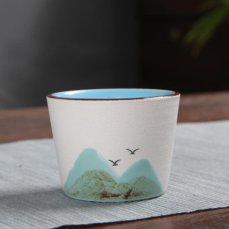 Hand-Painted Black Pottery Zen Tea Cup - Retro Mountain Design, Kung Fu Ceramic Masterpiece for Tea Tasting and Guest Reception.