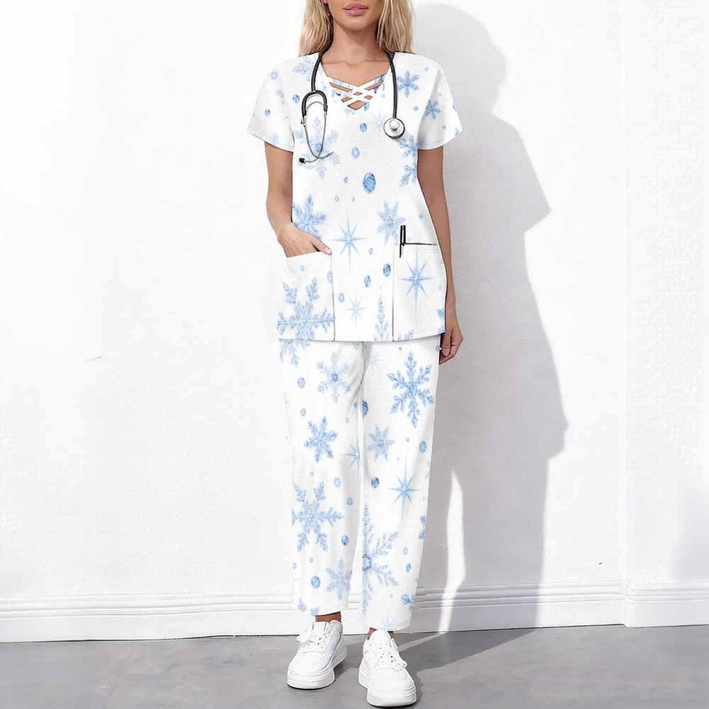 Women Plus Size White Floral Printed Scrub Set Cutout Neck Short Sleeve Pocket Top Long Pants