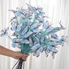 An artificial butterfly branch used for weddings, family offices, parties, decorating vases, and floral arrangements