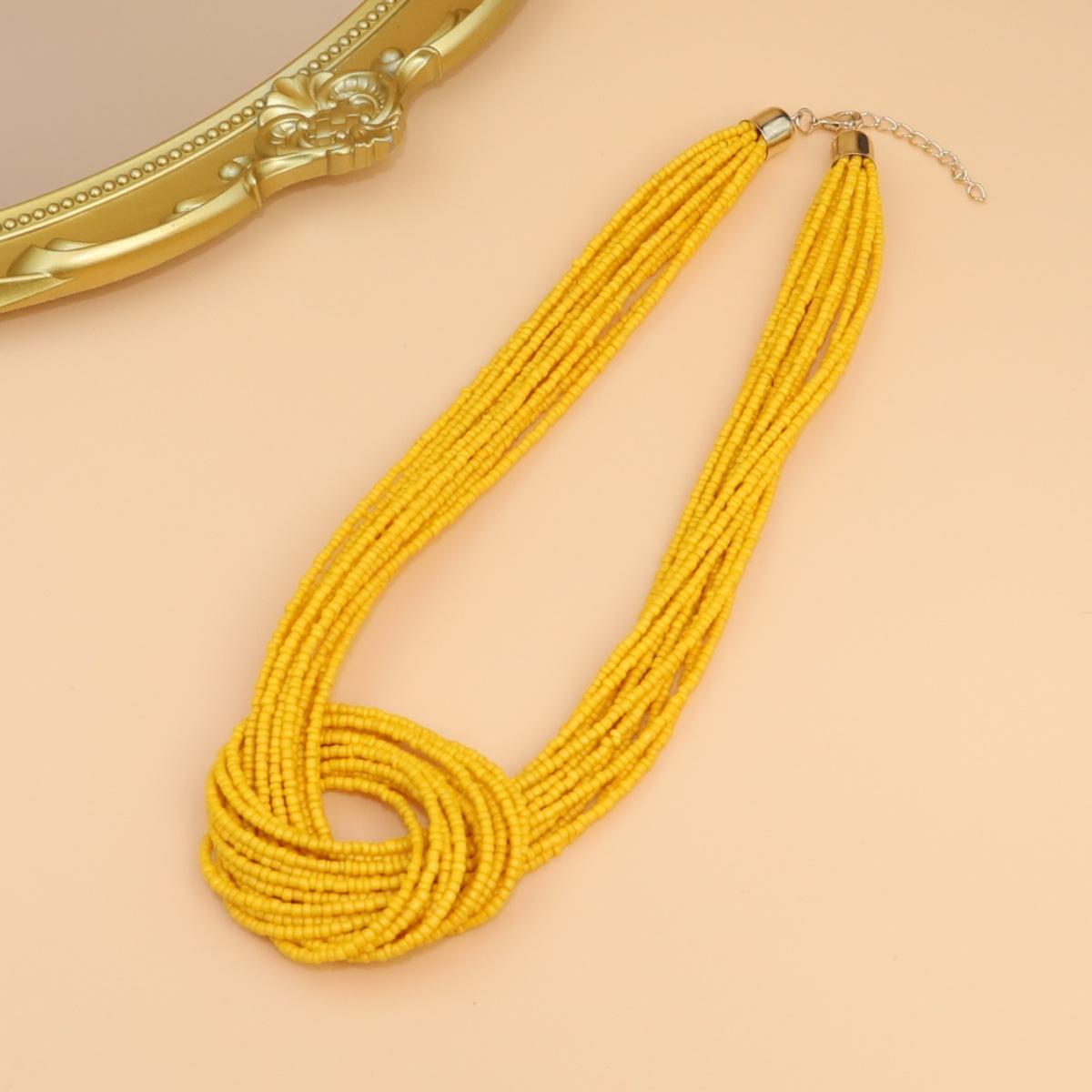 Богемное этническое многослойное колье из рисовых бусин с цветными блоками