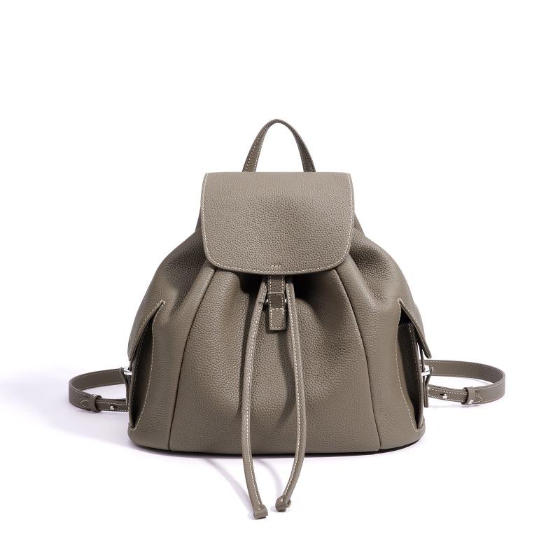 Casual drawstring flip backpack women s early spring niche literary commuter portable leather women s bag