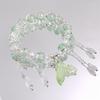 Handgefertigtes Perlenarmband für Damen Elegantes Schmetterlings-Quasten-Anhänger-Accessoire für Geburtstagsgeschenk
