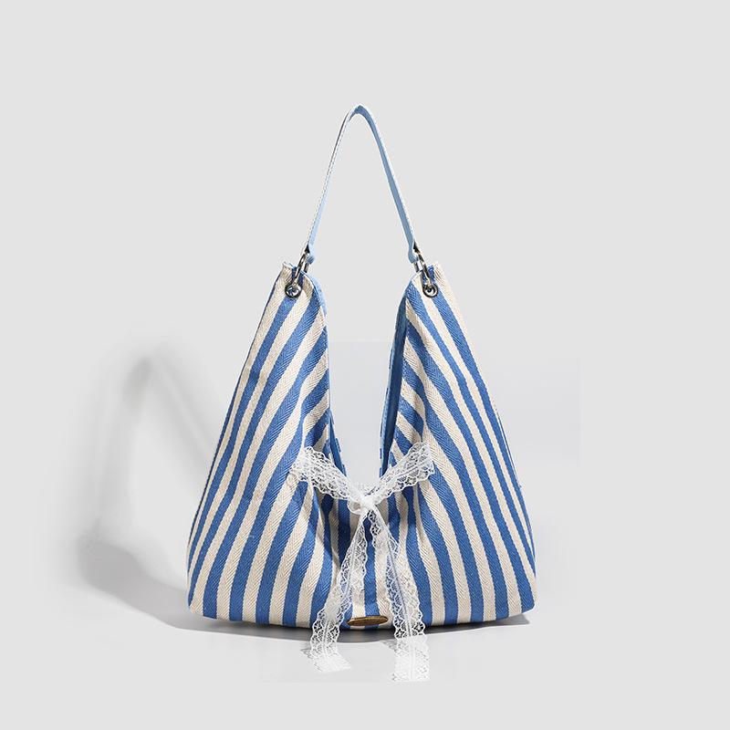 

2025 summer new lazy style canvas silk scarf striped large capacity striped contrasting color literary single shoulder underarm handbag синий