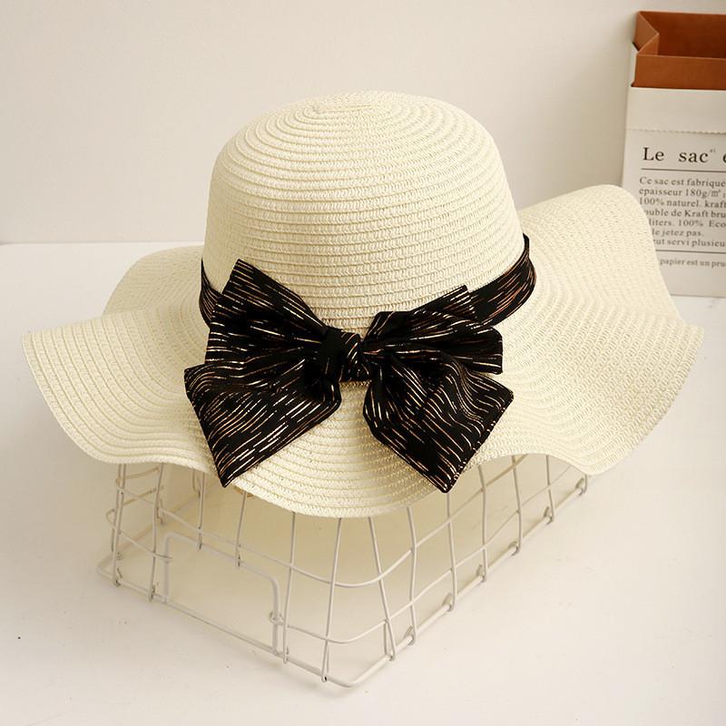 

Fashionable Women s Summer Straw Hat With Butterfly Bow And Wave Edge Ideal For Beach Vacation Sun Protection білий