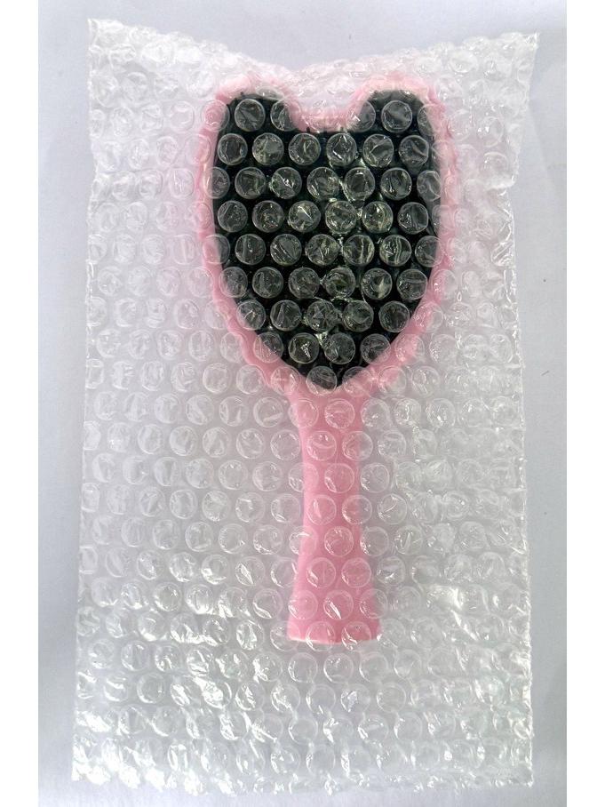 

Жіноча багатофункціональна гребінець для укладки та масажу волосся