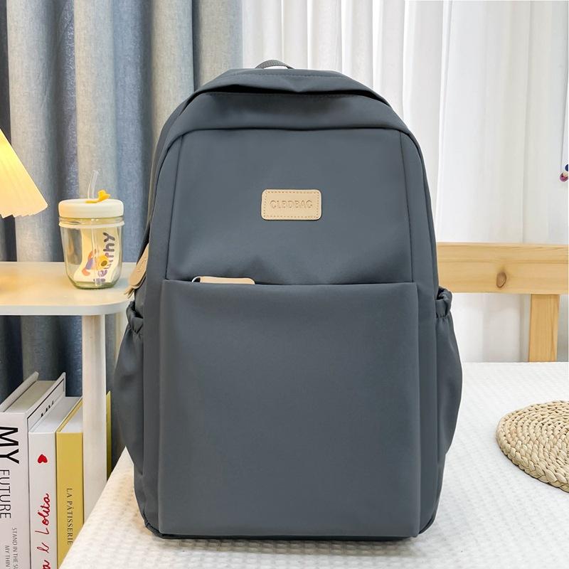 

Computer backpack large capacity new commuter backpack high value simple spine protection student bag сірий колір