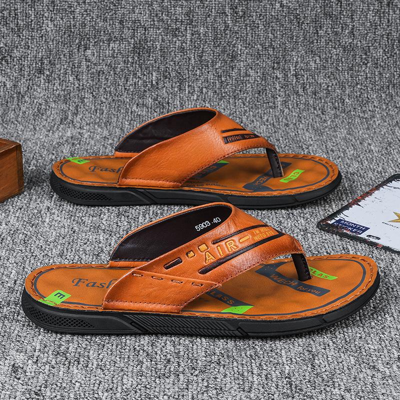 2025 high-end comfortable men's summer wear a pedal on the first layer of cowhide men's flip-flops European station slippers men's trend