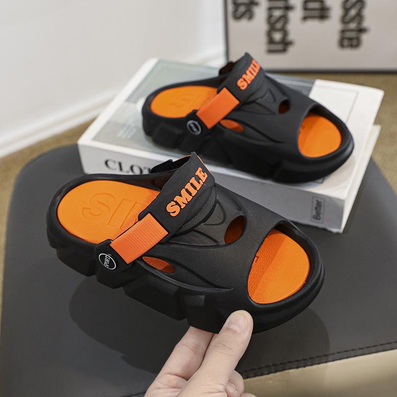 

Slippers wholesale boys and girls indoor household one-word mops external wear dual-purpose thick-bottomed non-slip and wear-resistant sandals 30 чорний