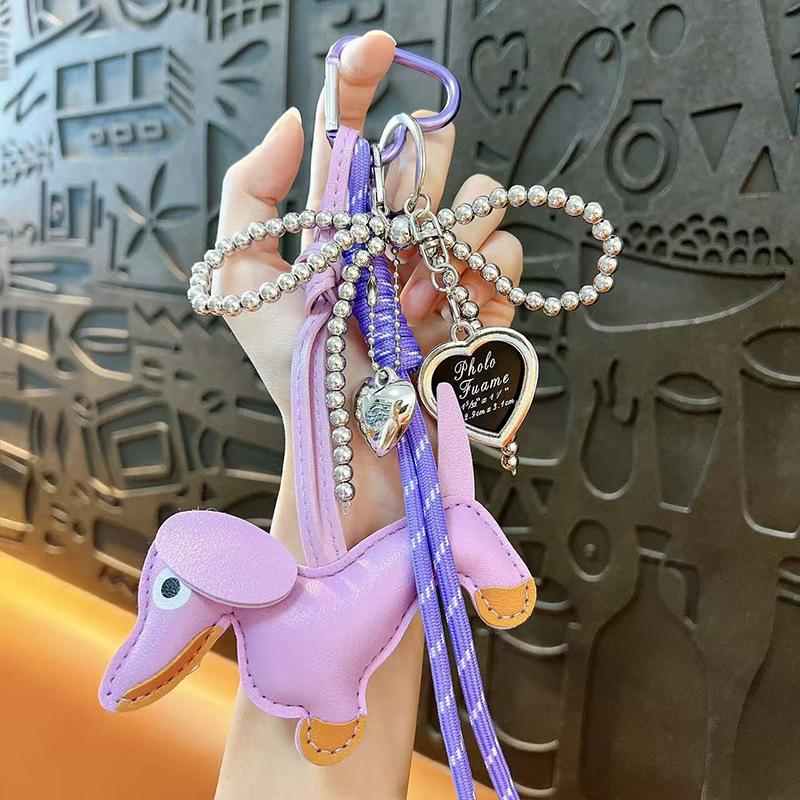 Creative new dachshund leather bag hanging keychain exquisite bow love bag pendant small gift wholesale