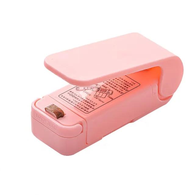 

Мини-портативный термоупаковщик для пищевых продуктов Вакуумный упаковщик для закусок Термоупаковщик для пластиковых пакетов розовый