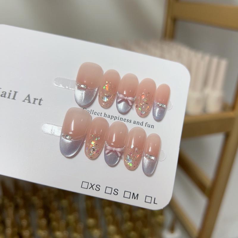 

Dollya Нежно-розовый французский бант Кошачий глаз Отбеливание кожи Ручная работа Накладные ногти