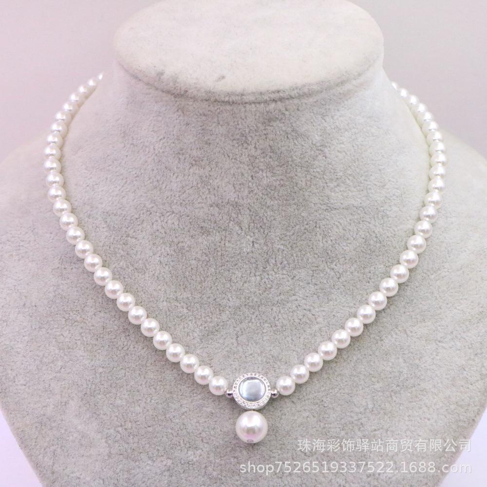 

Cross-border fashion aquamarine imitation Shijia pearl necklace pendant women s light luxury niche collarbone chain does not peel millet beads