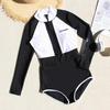 black and white long sleeve one-piece