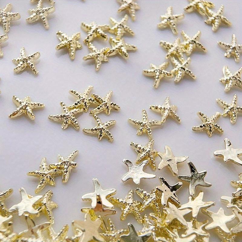 Goldene Seestern-Nagelanhänger Meeresstil Glitzernde Strasssteine Stern-Nagelkunst-Dekorationen Frühling Sommer 10 Stück 3D-Legierung DIY-Nagelsteine Geschenk für Mädchen