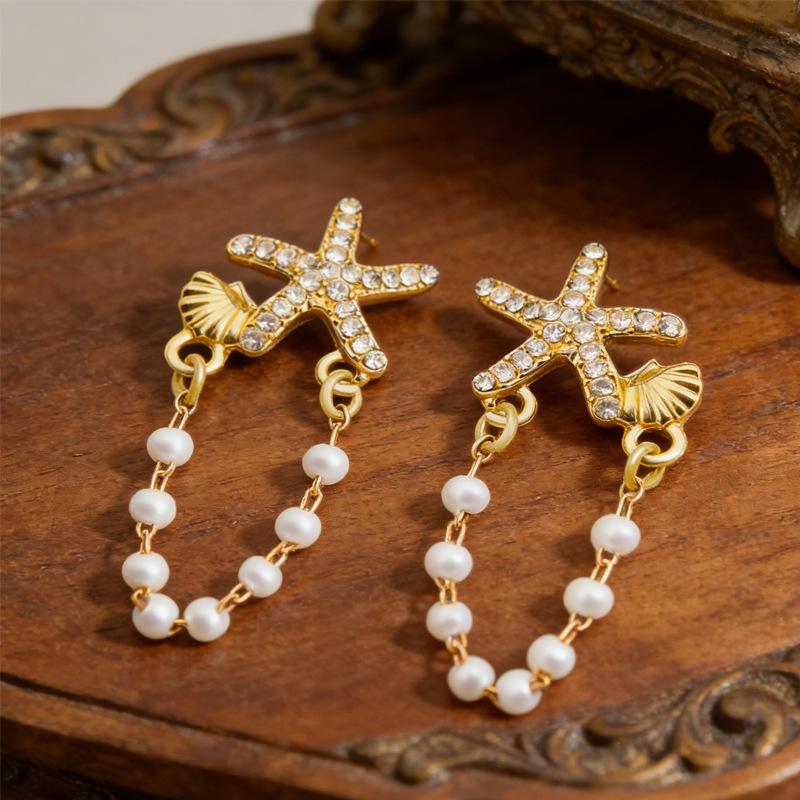 Sweet and fresh Korean version earrings niche star shell string pearl stud earrings