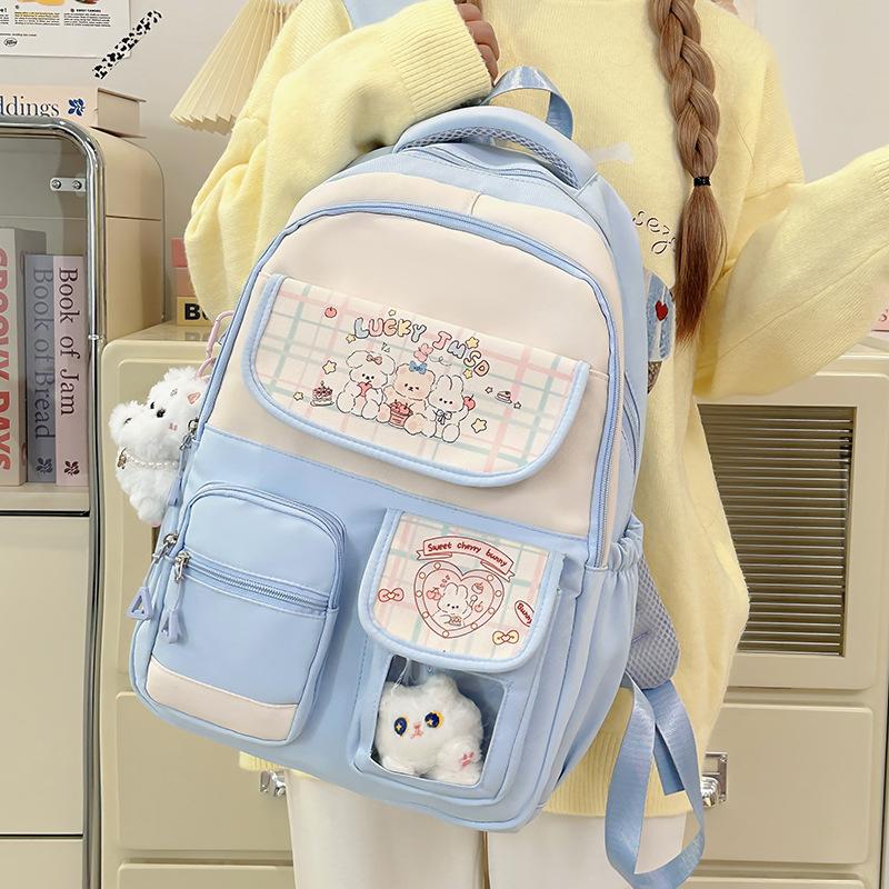 Cute cartoon print contrasting colors large capacity junior high school high school backpack exquisite burden reduction student schoolbag female