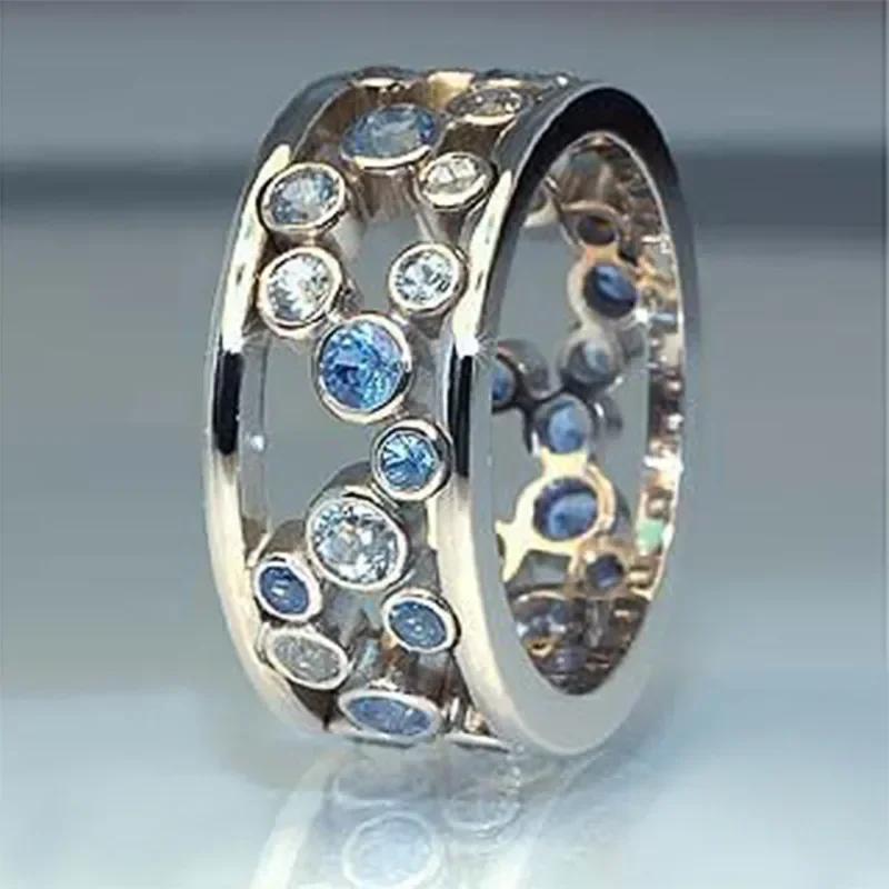 

2026 New Hollow Out Blue White Zircon Shining Diamond Ring Alternating Design Women s Ball Versatile Fashion Zircon 6