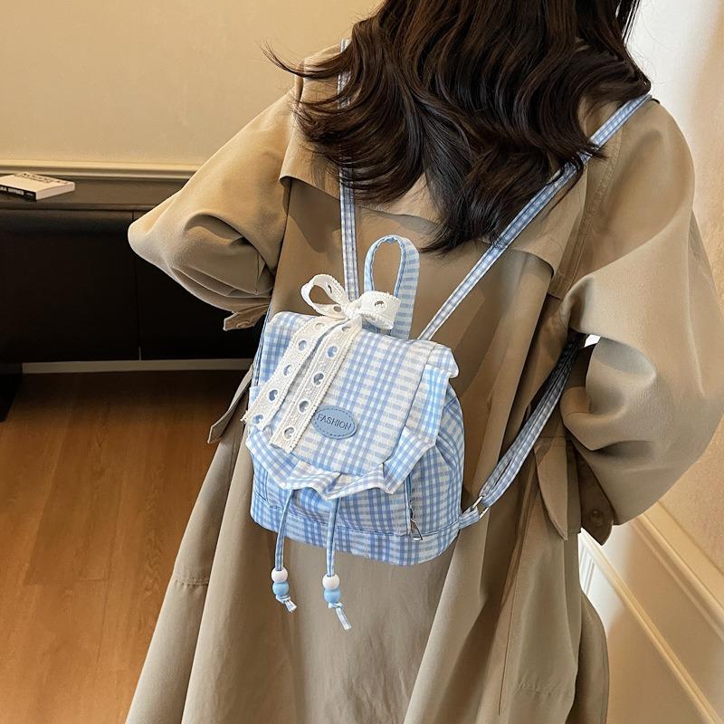 Wind lace plaid backpack autumn new niche design fluffy ruffle edge diagonal span bag women
