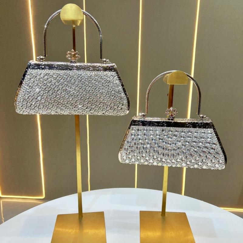 A Fashionable and Elegant Handbag for Ladies, A Chain Crossbody Bag, and A Diamond-encrusted Hand-held Bag