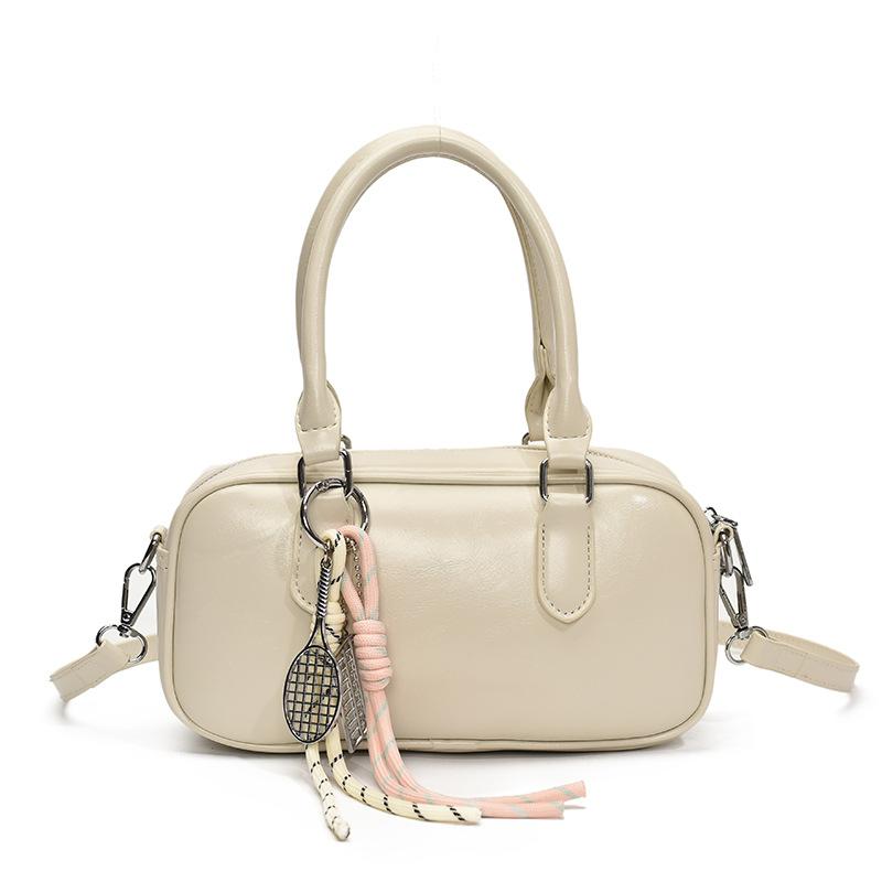 Retro commuting simple Korean version casual solid color portable bowling bag fashion high sense versatile commuting messenger bag