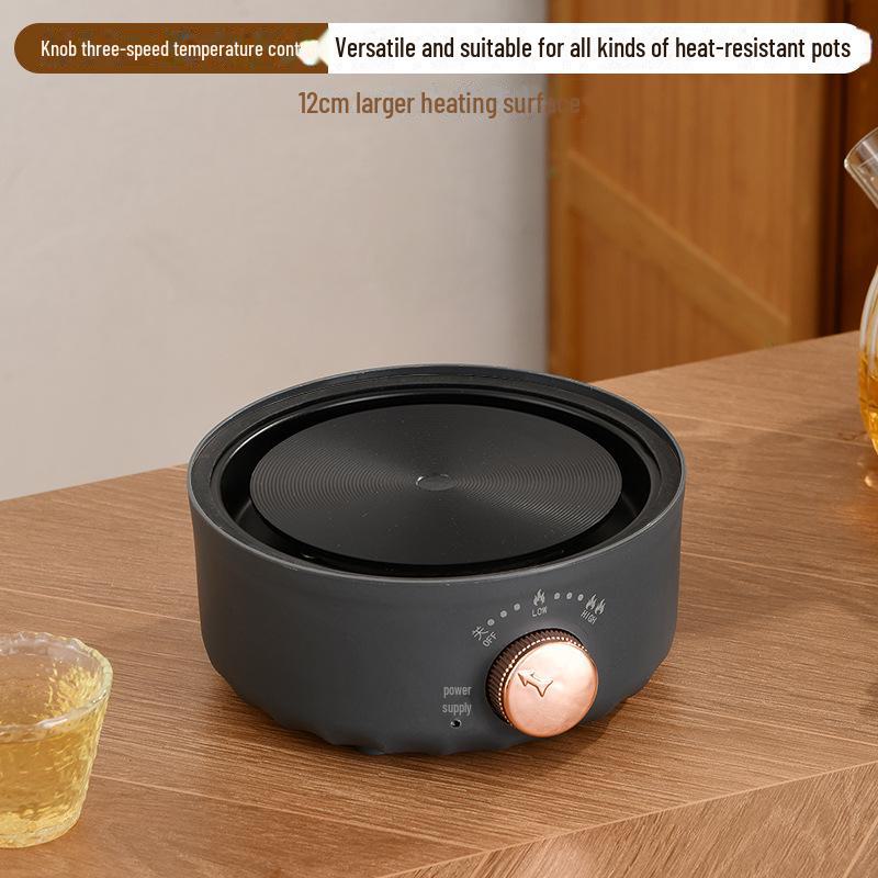 

Компактна електрична нагрівальна піч для чаю, вина та молока: Ізоляція та контроль температури