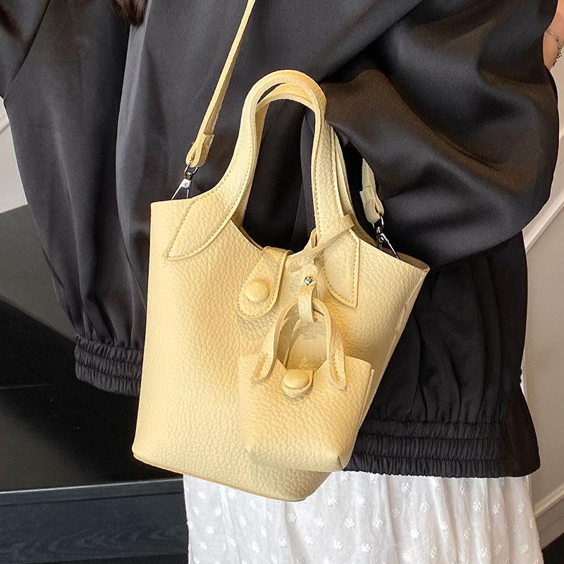 Korean hot-selling simple and high-end lychee pattern portable vegetable basket bag niche design fashionable and versatile messenger women's bag