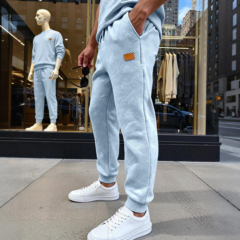 Men's Loose and Simple Casual Sports Commuting Sweatpants with the Same Texture Pattern at the Counter