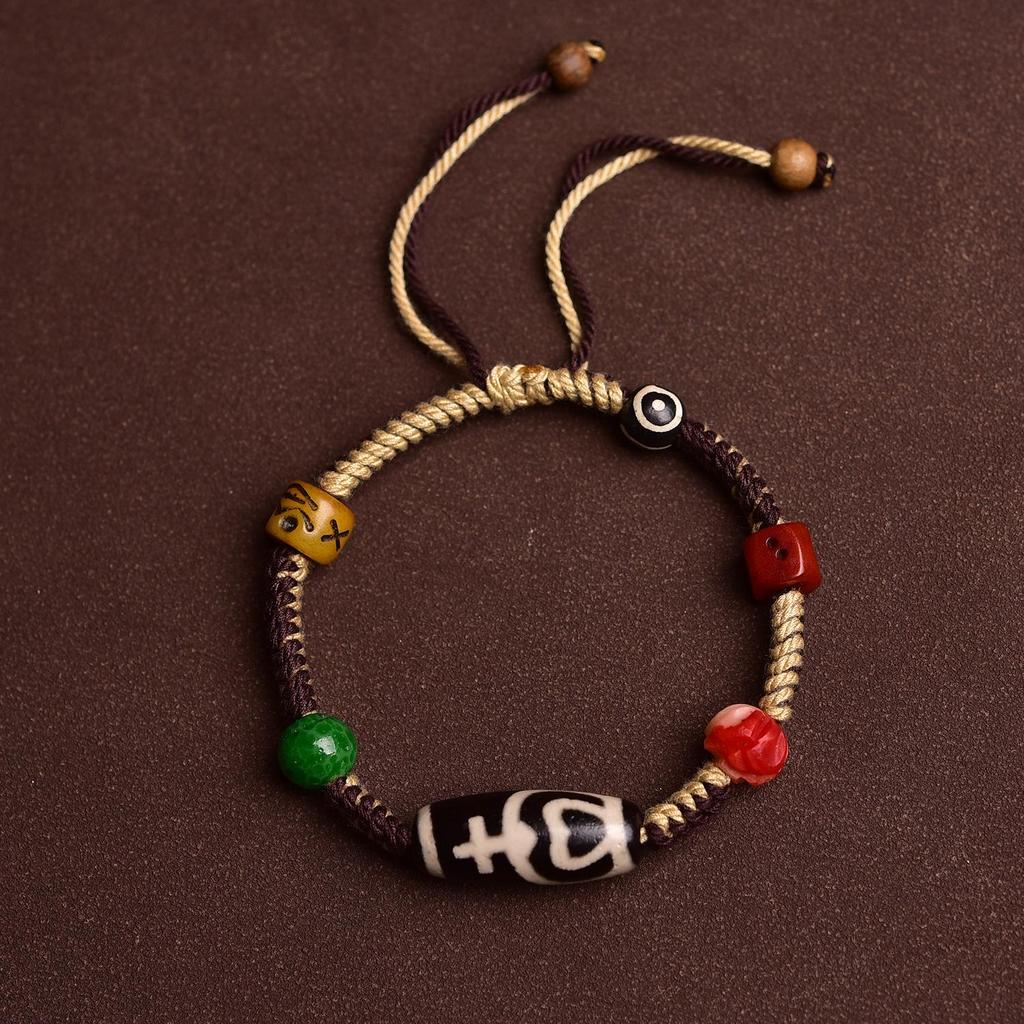 Adjustable Tibetan Handcrafted Dzi Bead Bracelet with Auspicious Hand-Rubbed Cotton Cord