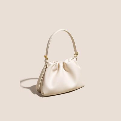 Uma Bolsa de Ombro Única, de Alta Gama, Portátil, da Moda e Versátil para Mulheres, Uma Bolsa Transversal Casual de Couro Camada Superior em Formato de Nuvem